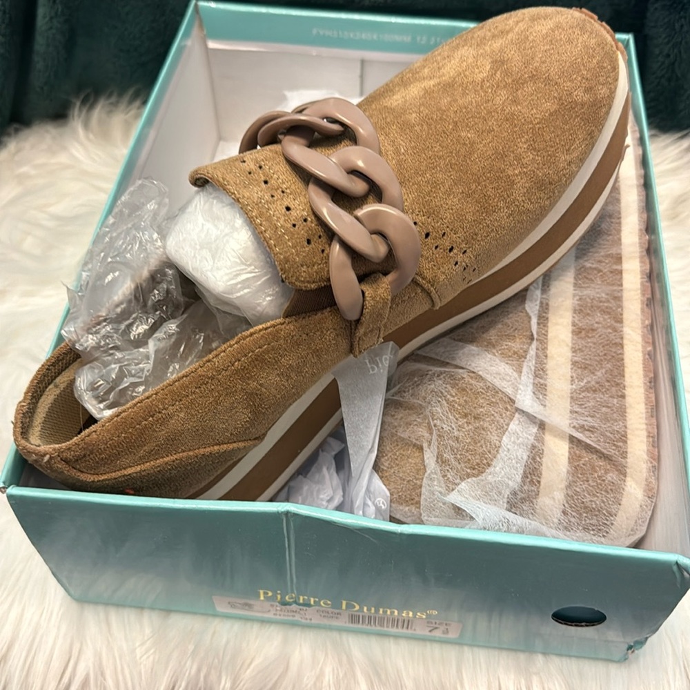 Brand new in box, size 7.5